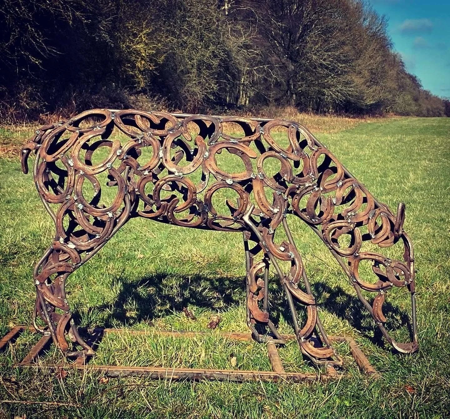 Life-size stag and doe steel wildlife sculpture by Charles Elliott