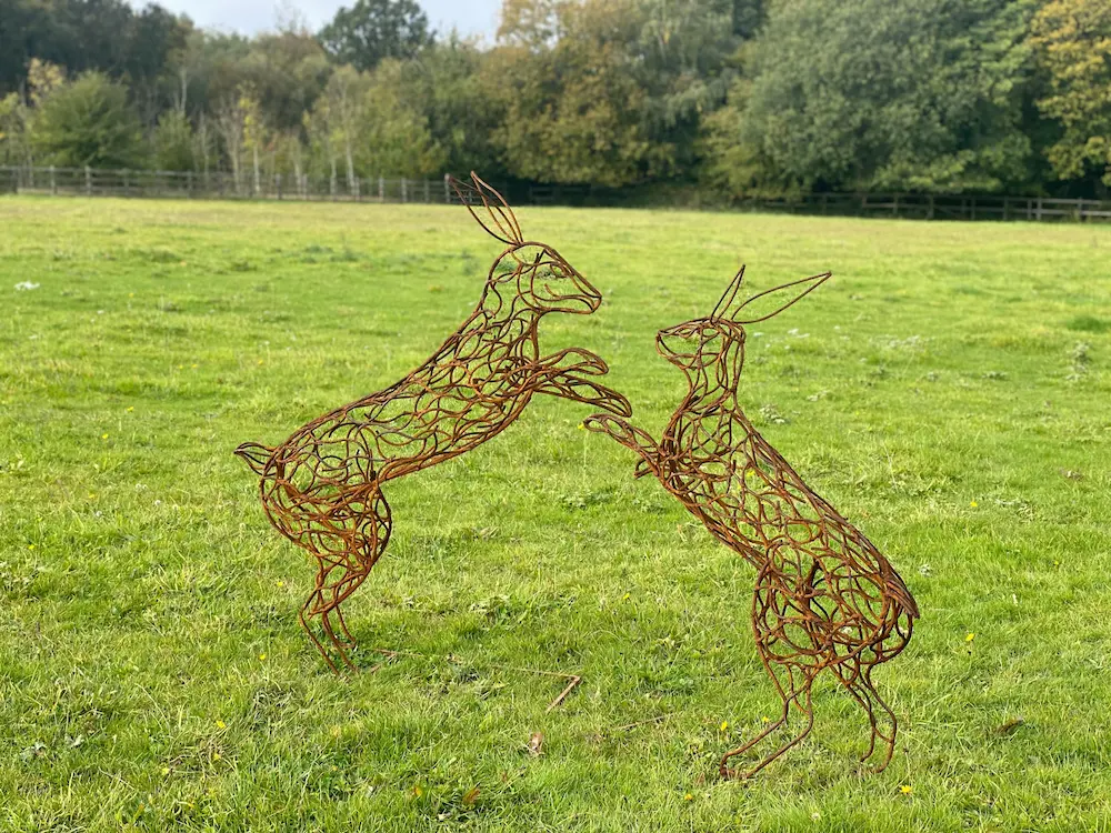 Boxing hares sculpture