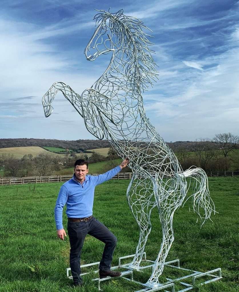 Rearing Horse Sculpture In Large Field