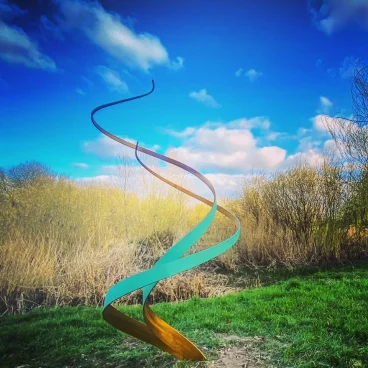 abstract green swirl sculpture