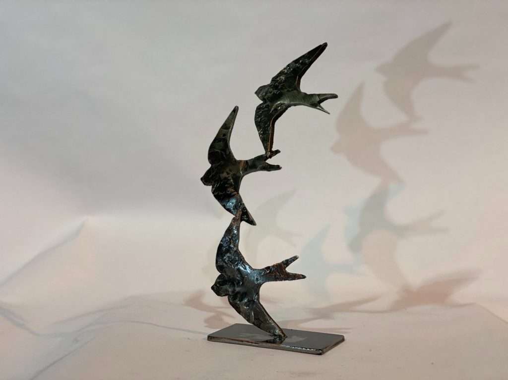 three Swifts in Flight