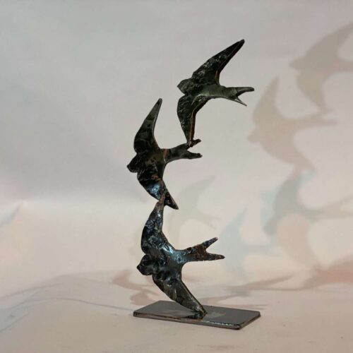 three Swifts in Flight