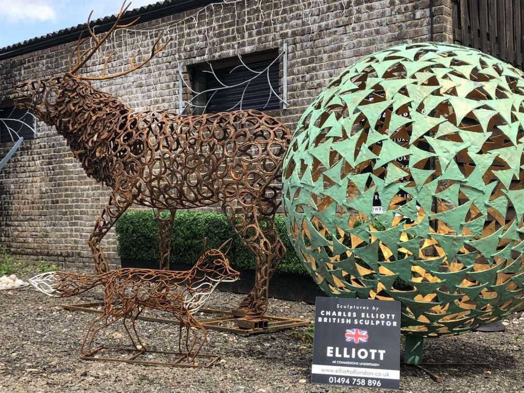 Warehouse Sculptures With Elliott Sign