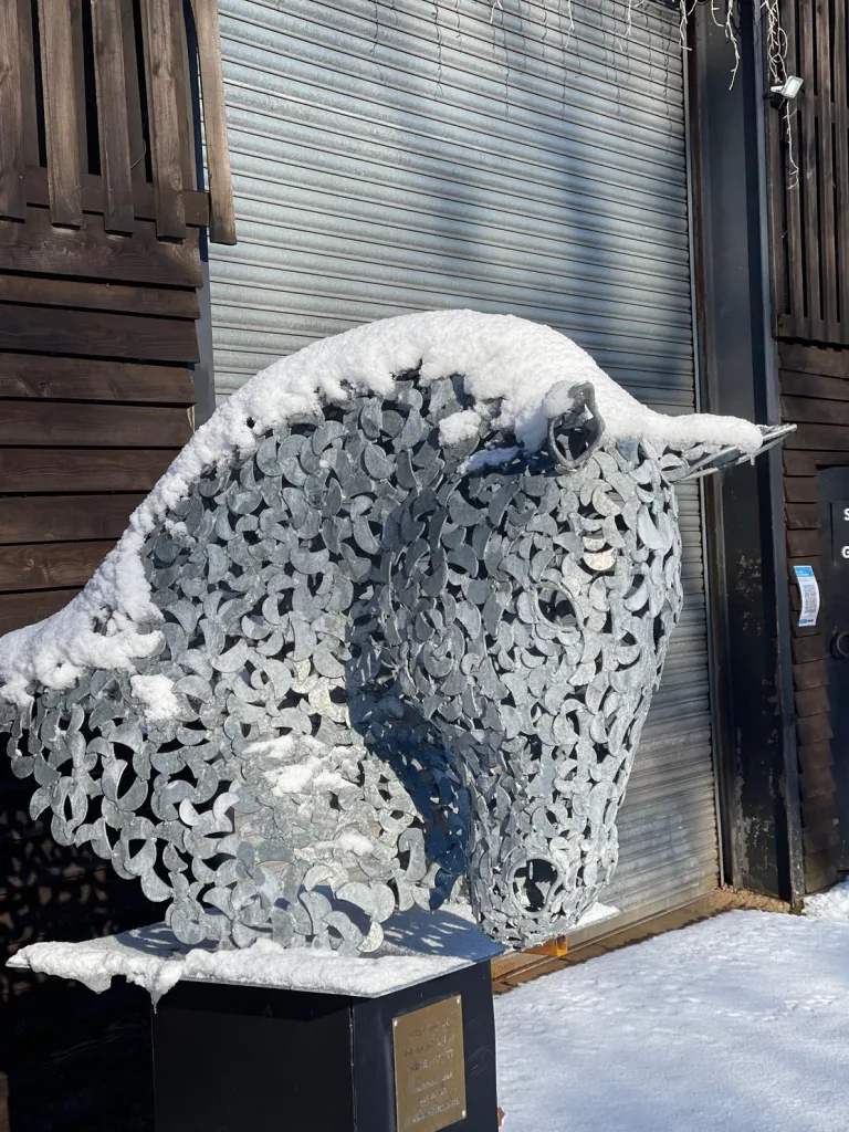 Silver Horse Sculptures in the Snow