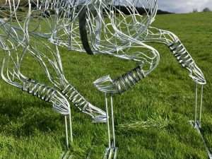 Legs Of Playing Polo Sculpture