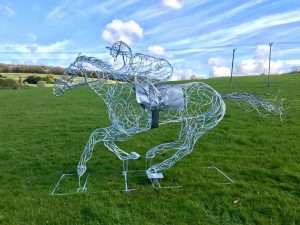 Horse and Jokey Riding Sculpture