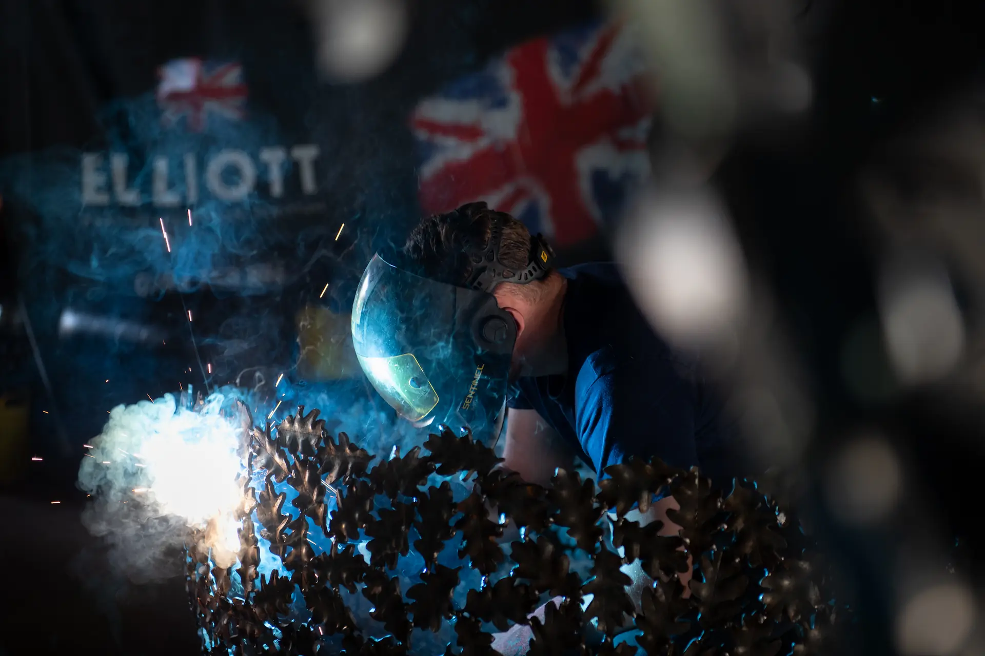 Sculptor Charles Elliott welding a bespoke steel sculpture by hand at his British studio in the Chiltern Hills