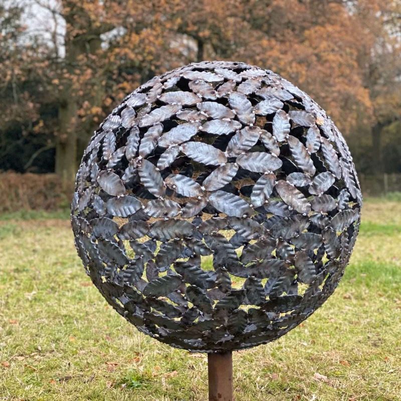 Beech Leaf Sphere Sculpture In A Field
