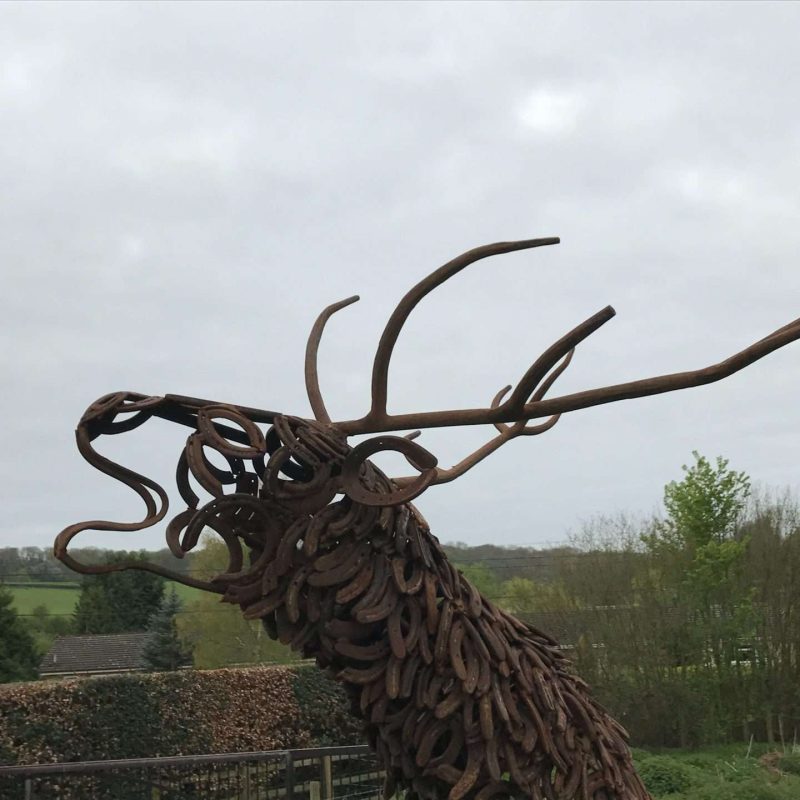 CLIMBING STAG BELLOW sculpture