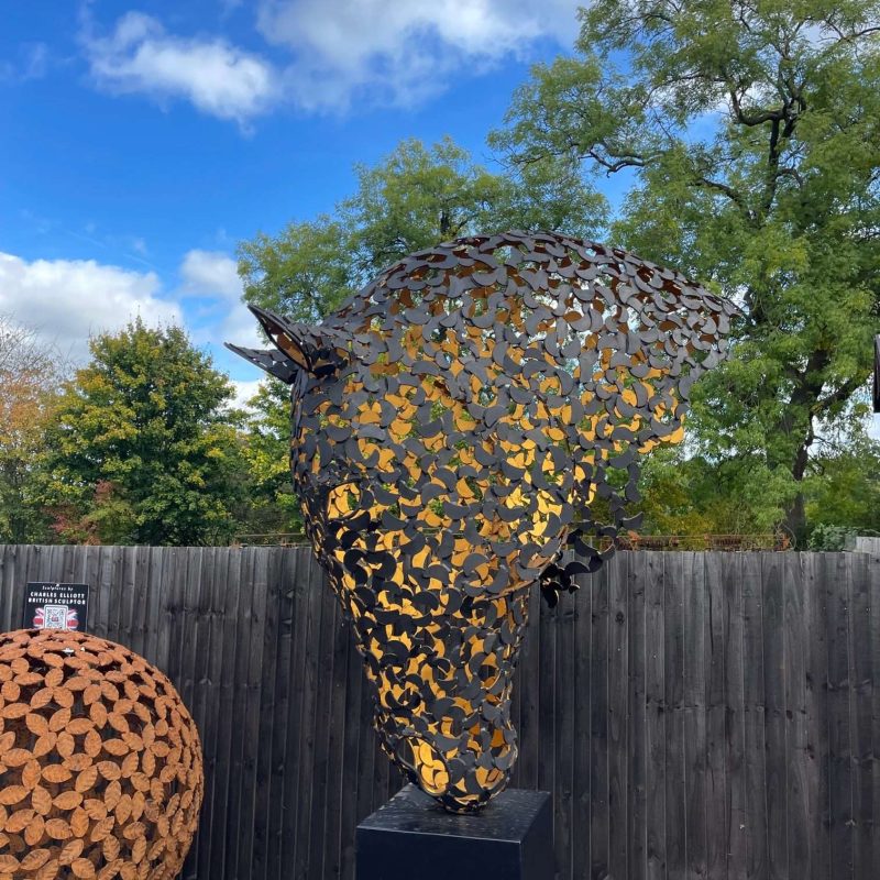 black and gold horse head sculpture