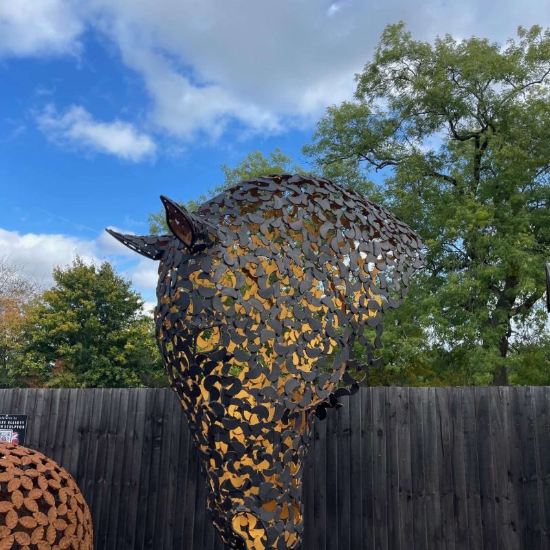black and gold horse head sculpture