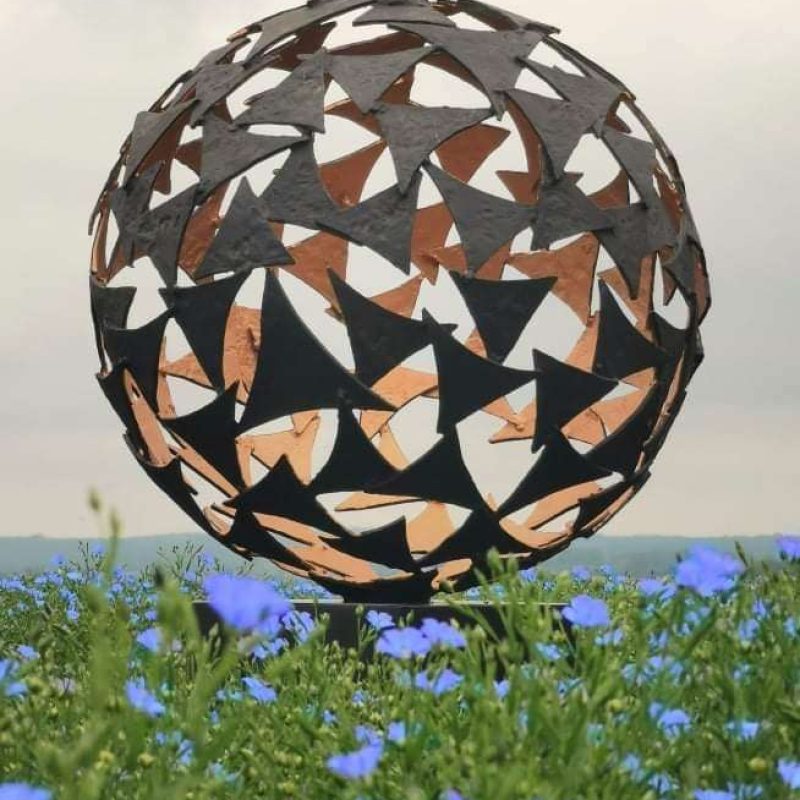 black and gold sail sphere sculpture