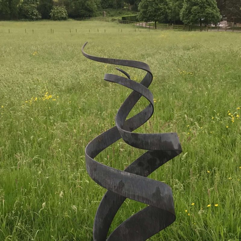 Spiral Abstract Sculpture At Dusk