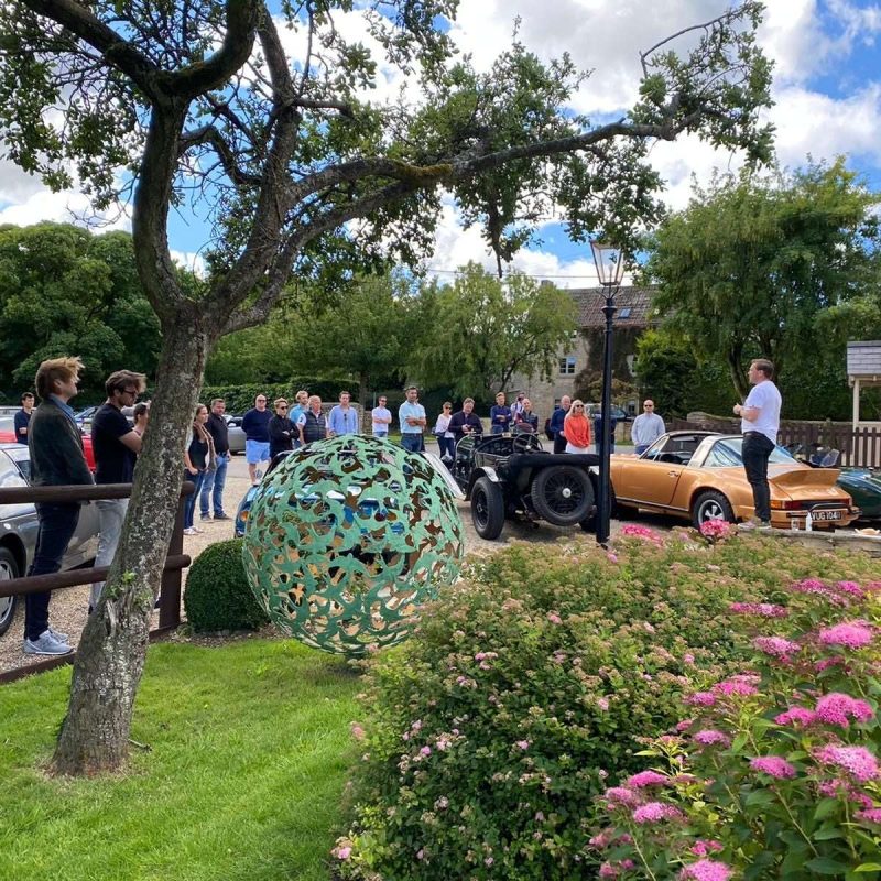 Swift Sphere Sculpture surrounded by spectators