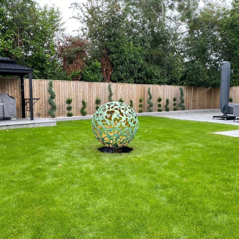 Swift Sphere Sculpture in a large garden