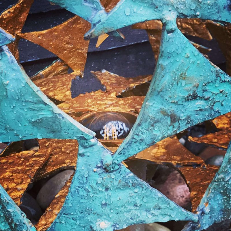 Close Up Of Verdigris Gold Column Sculpture