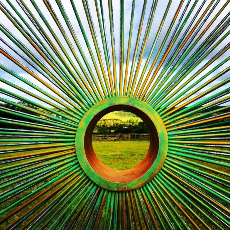 Close Up Of Verdigris Gold Peacock Sculpture