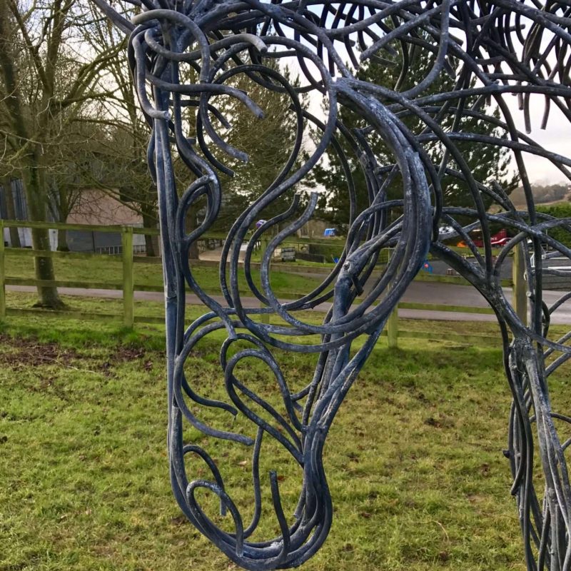 Face Of Rustic Horse Trotting Sculpture