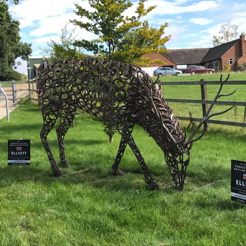 Horseshoe Stag Sculpture Next To Driveway