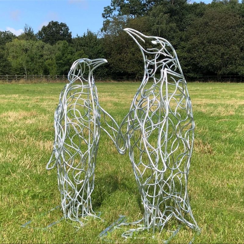 Penguins Holding Hands