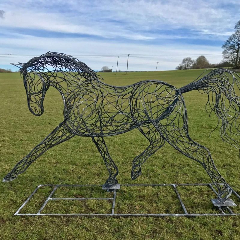 Side Of Rustic Black Horse Sculpture