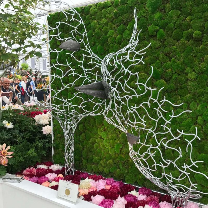 Side Of Faces Structure Sculpture At Show