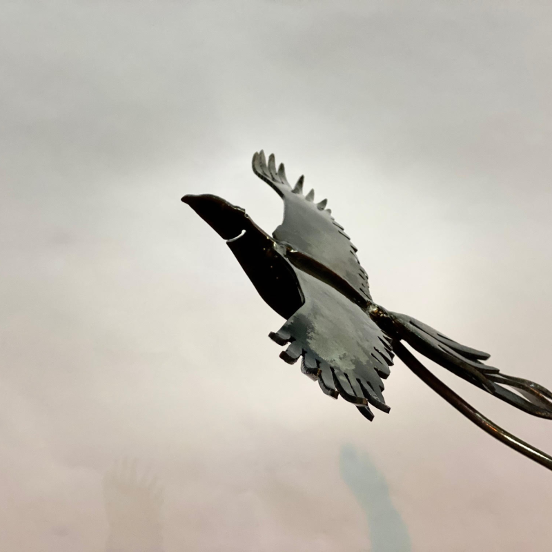 One Black Bird Flying Sculpture