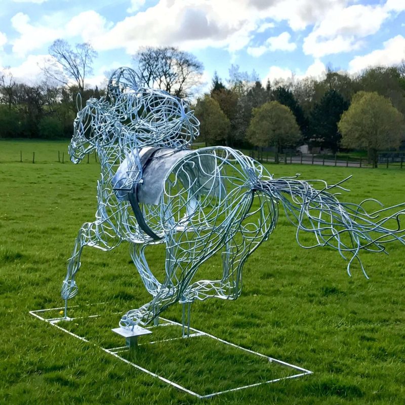 Back View Of Horse and Jokey Design