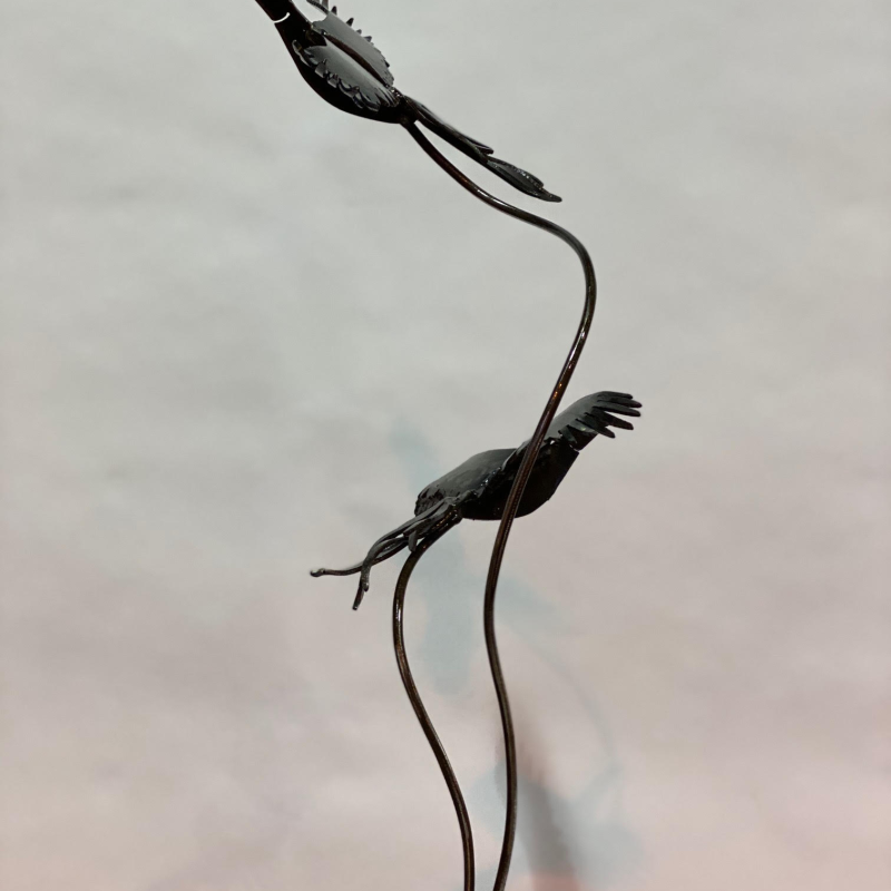Birds Sculpture With Cloudy Background